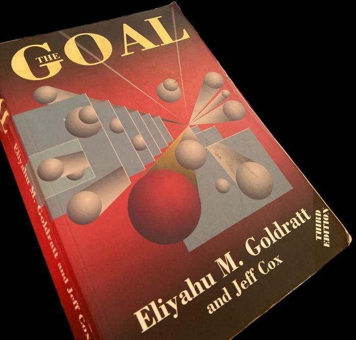 Cover of the book 'The Goal' by Eliyahu M. Goldratt and Jeff Cox Cover of the book 'The Goal' by Eliyahu M. Goldratt and Jeff Cox. A focus on operational efficiency and business management.