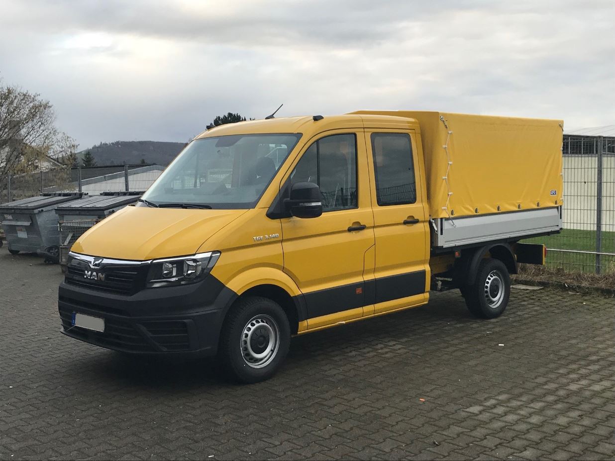 MAN TGE DOKA mit Planenaufbau