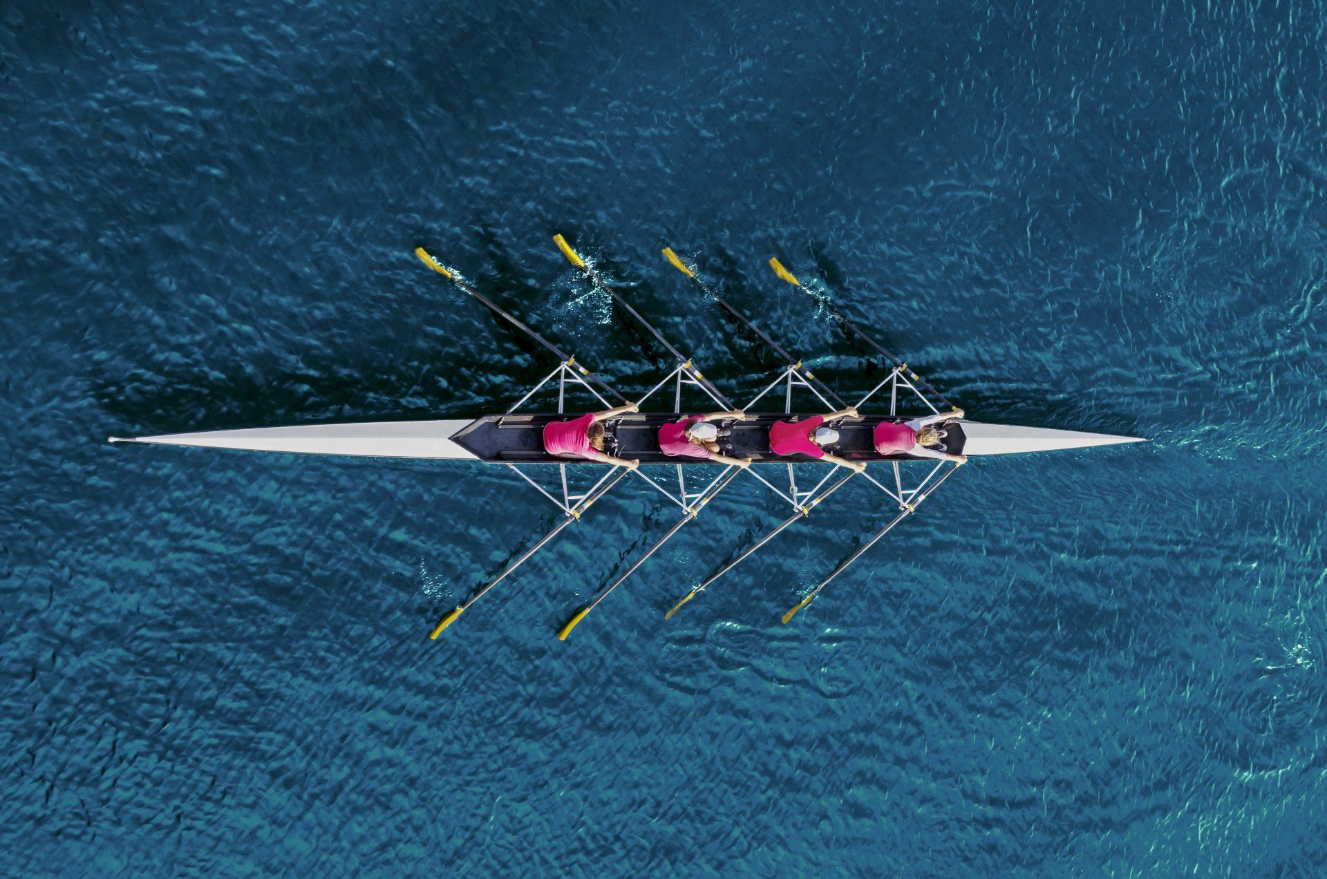 Four people rowing