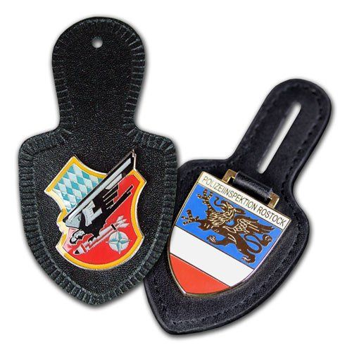 Schlüsselanhänger aus Metall, geprägt mit dem eigenen Wappen oder Logo, von der W. Schwemmlein GmbH aus Bayreuth