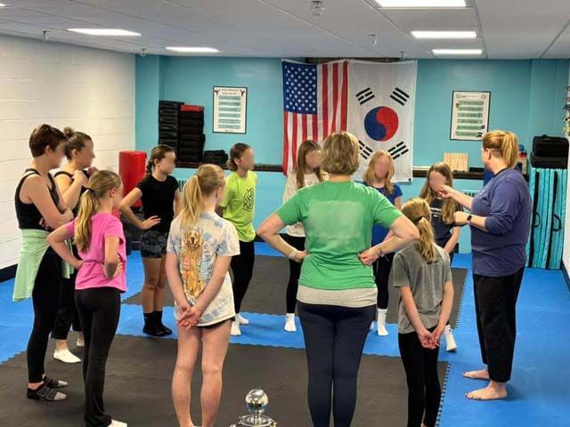 Group of women taking Second Natures women's self-defense class