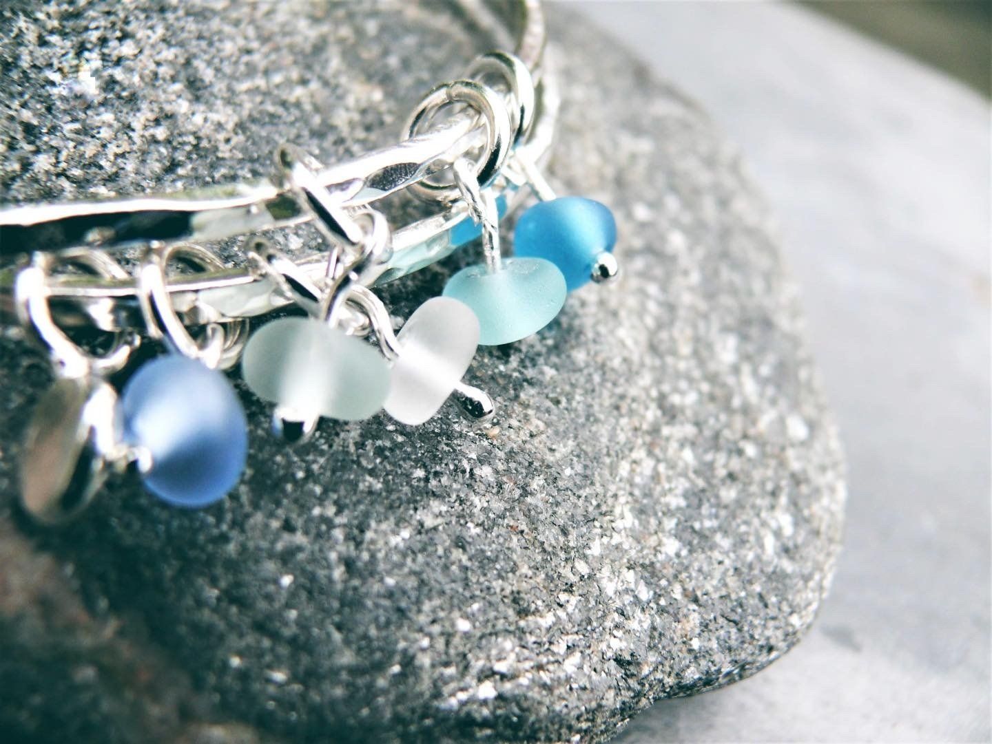 scottish sea glass bangle and bracelet handmade in scotland.  White, blue and cornflower scottish sea glass found on a scottish beach