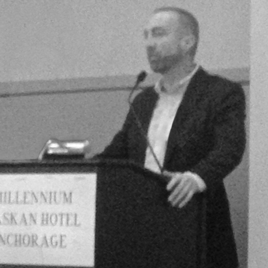 Ian McGaughey at podium