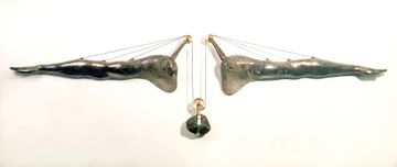 Ceramic and metal, 6' wide, $2600 two outstretched arms, raised by pulleys and counterweight.