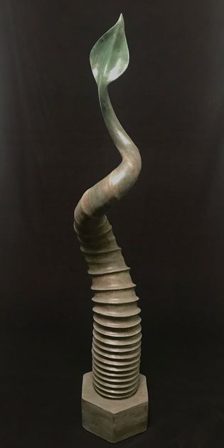 Glazed ceramic, 4' tall, $1800 a giant bolt on end, which transforms into a hesitant new seedling.