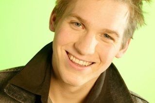 Bild: Junger Mann lachend