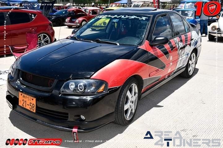 3er AniveImagen del reportaje de la revista Tuning Area4tuners.es, de la concentración de coches Tuning del año 2023 en rsario Brothers Cars Club
Imagen perteneciente al reportaje fotográfico de la revista Tuning de publicación diaria Area4tuners.es, de la concentración Tuning del año 2023 Chignahuapan, Puebla, México
