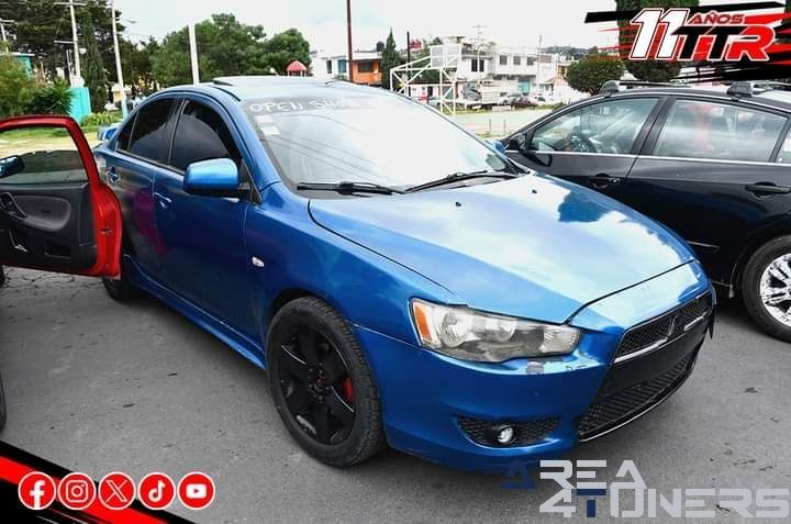 Chanchico Mula Fest
Imagen del reportaje de la revista Tuning Area4tuners.es, de la concentración de coches Tuning del año 2024 en Ciudad Serdán, Puebla, México.