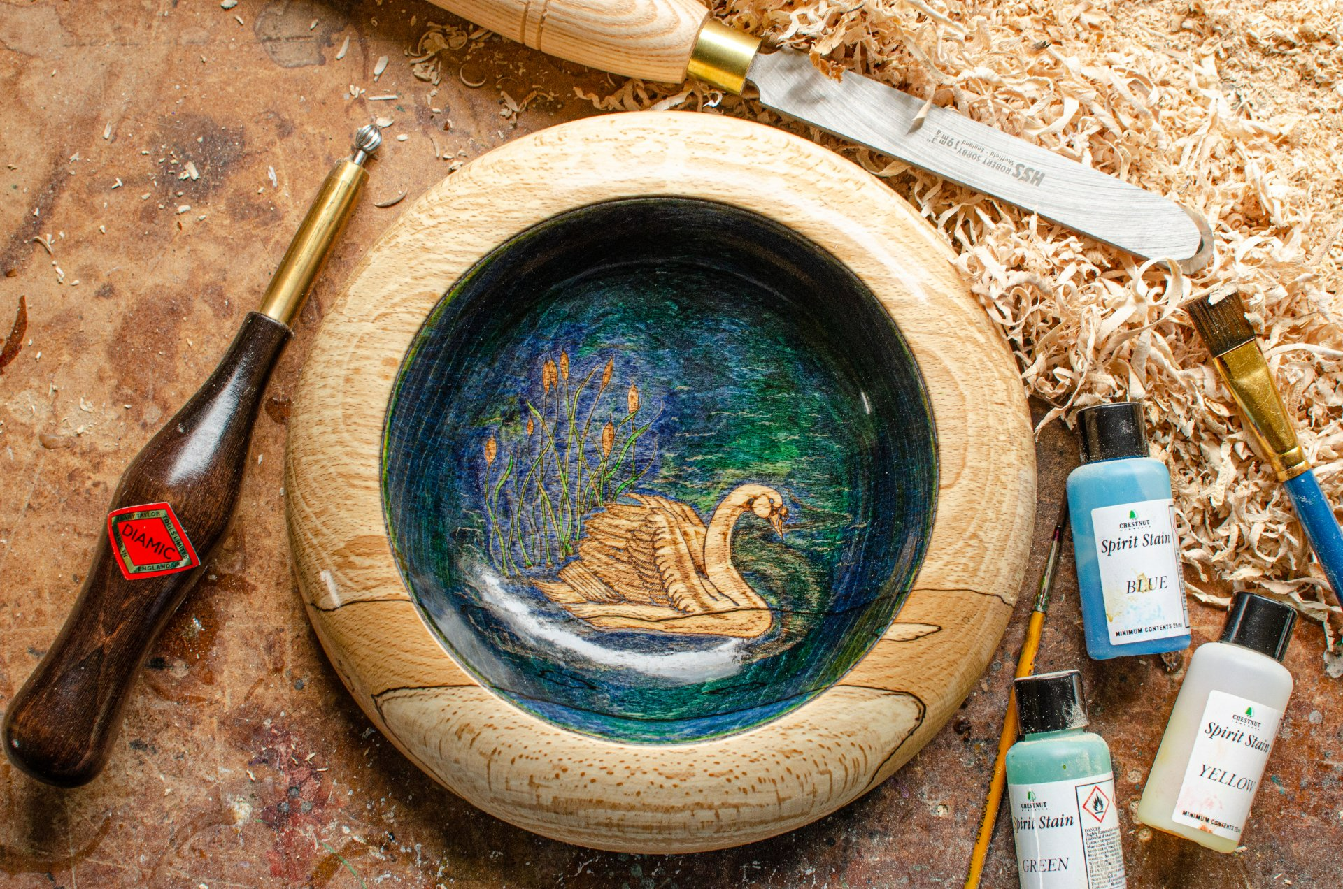 Pyrographed swan coloured with spirit stain, image from 'Woodburning Project & Pattern Treasury' by Deborah Pompano, bowl created by WoodyNess