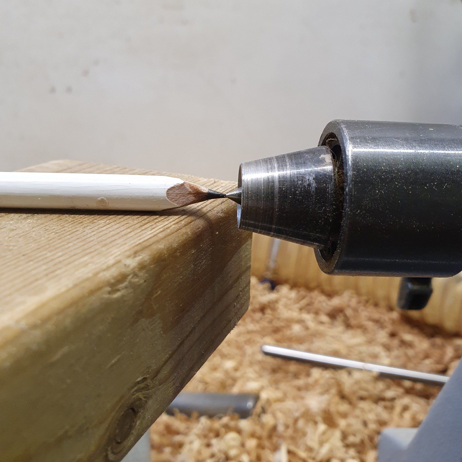 Centering Lathe tail stock and pencil to centre tool rest
