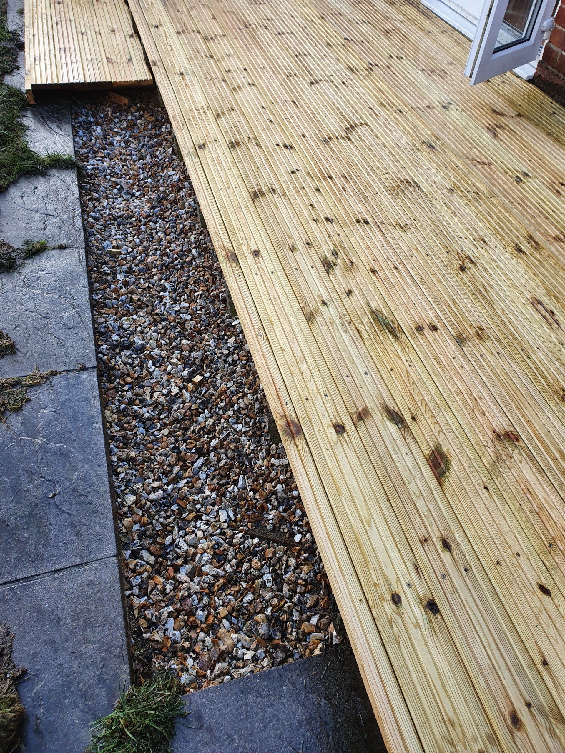 Pond filled in and new decking boards fitted
