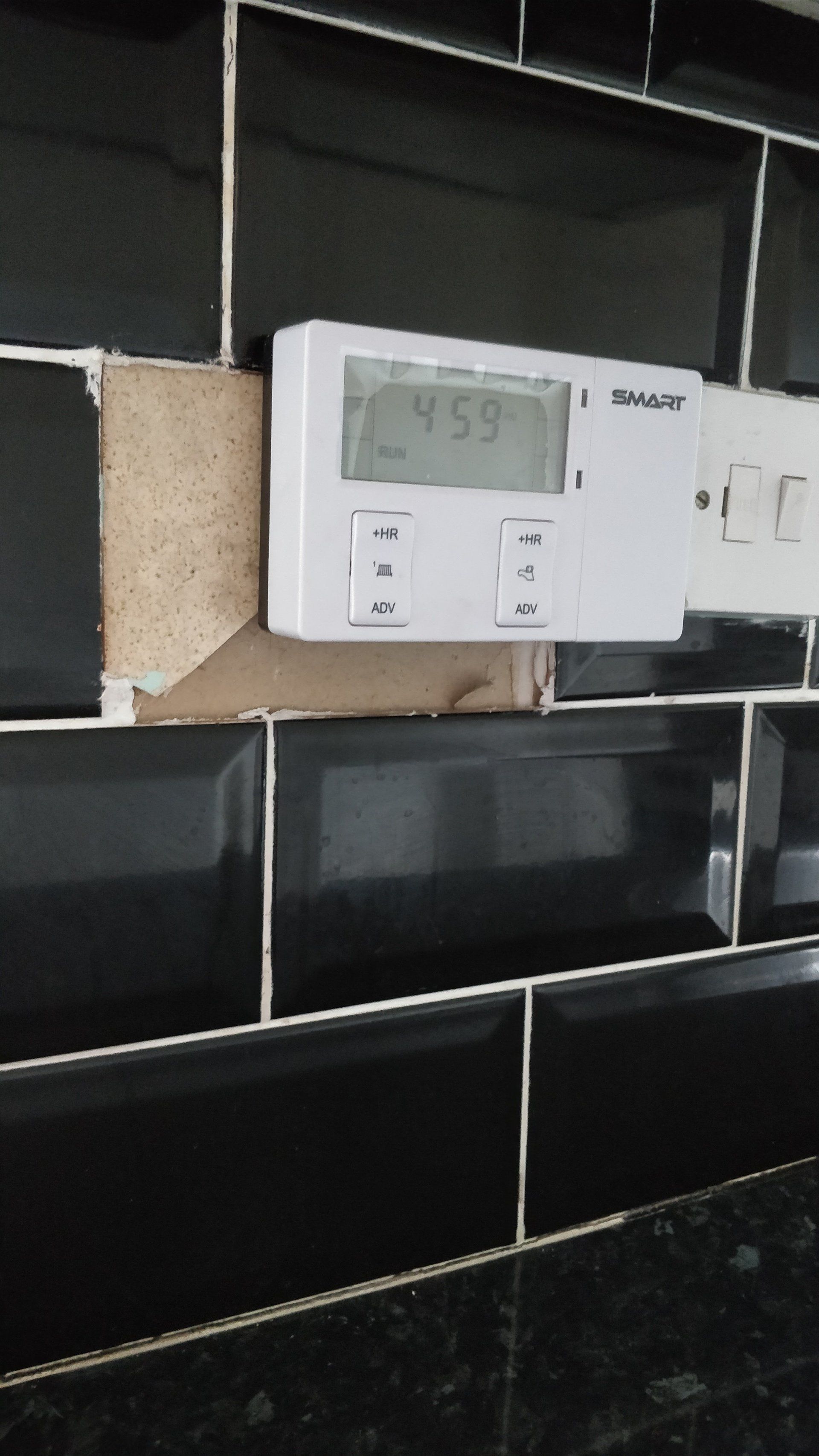 Tile on wall need reparing Tile broken