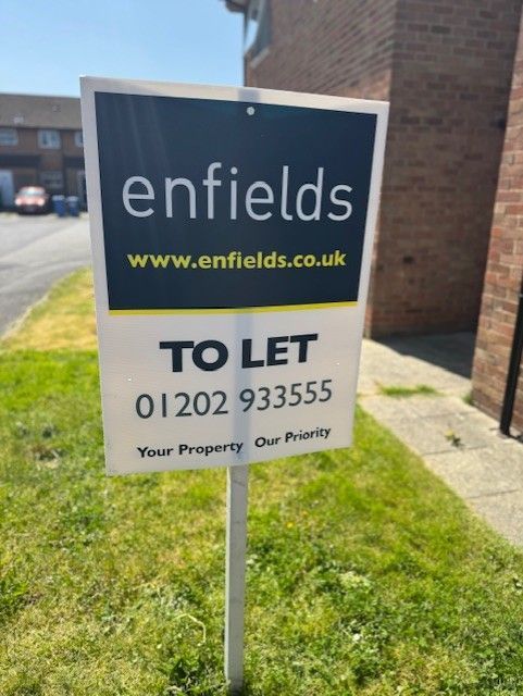 Enfield's Poole estate agent boards