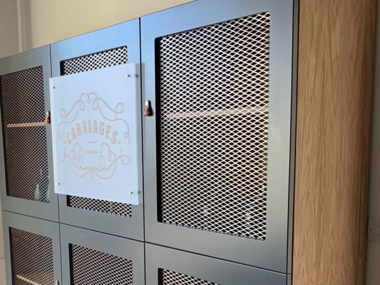 Bespoke cabinet with wire mesh doors