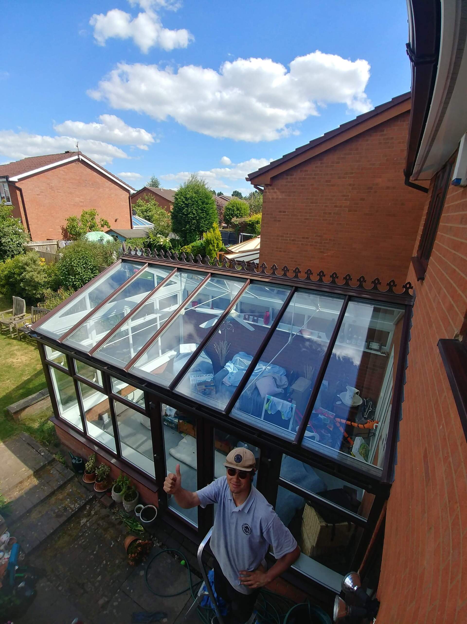 A big glass conservatory roof LDP Window Cleaning Ltd staff cleaned