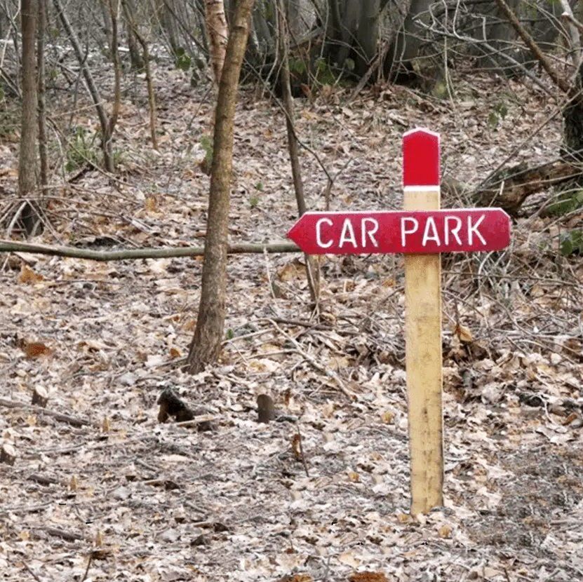 Trail sign post Norsey Wood