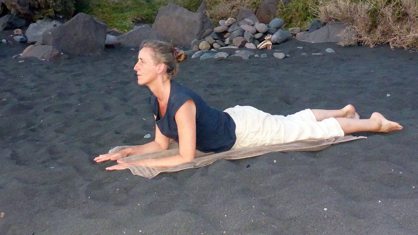 Yoga on the black beach of La Gomera