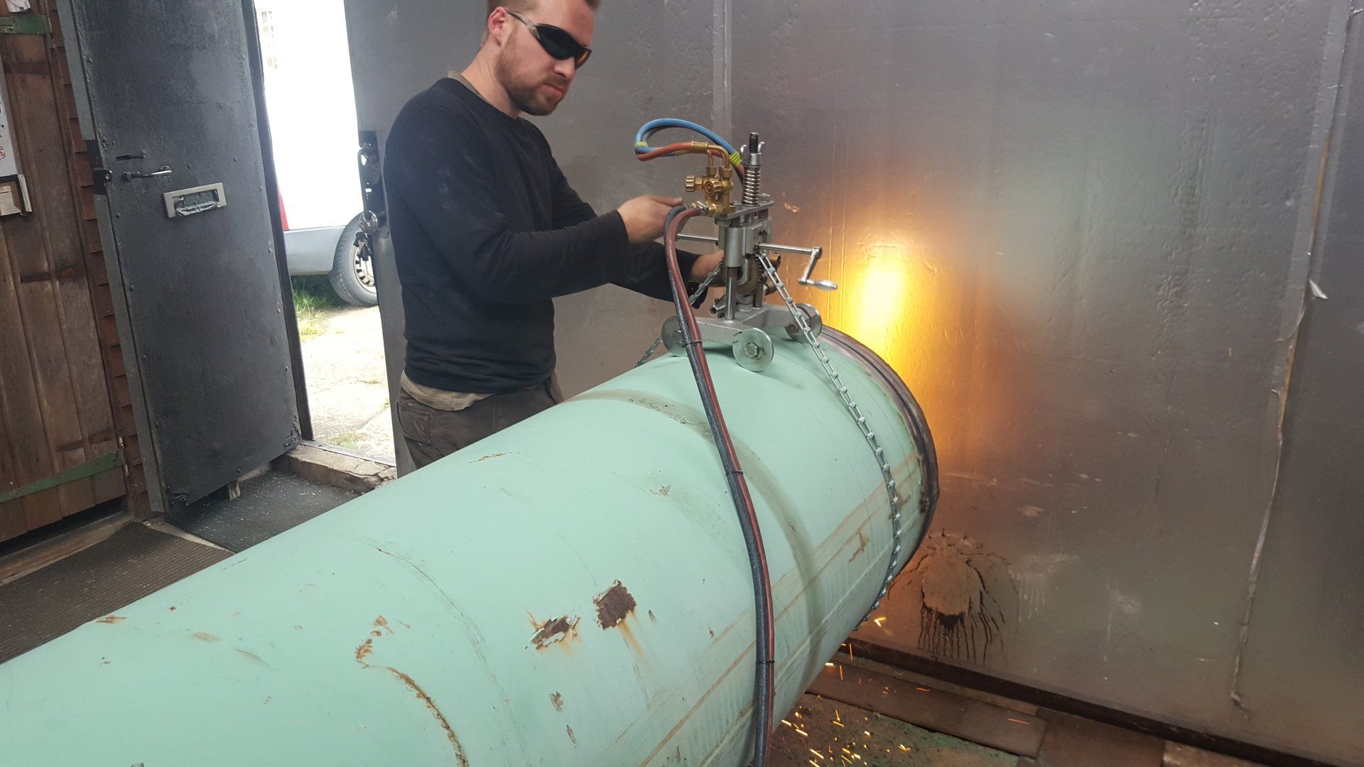Gas Cutting Chris gas cutting a large steel pipe