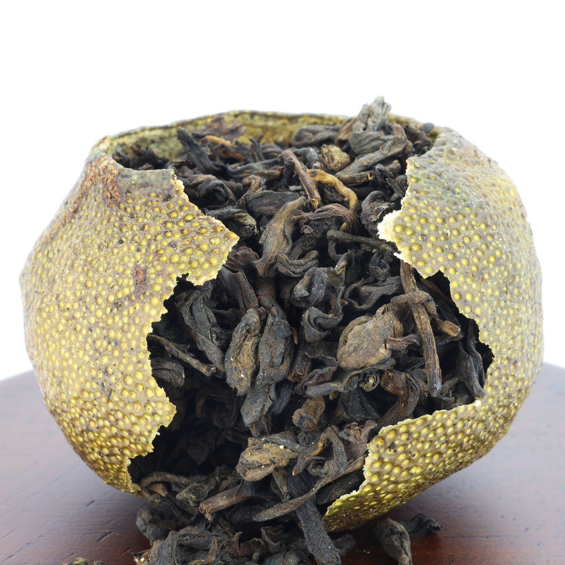 Dry tea leaves in tangerine.