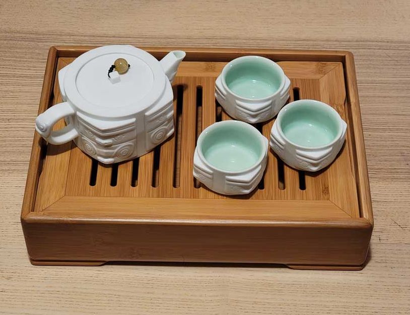 Chinese tea pot and tea cups for Pin Cha tea ceremony.
