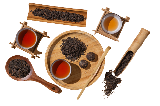 Dry tea leaves and small cups of brewed tea.