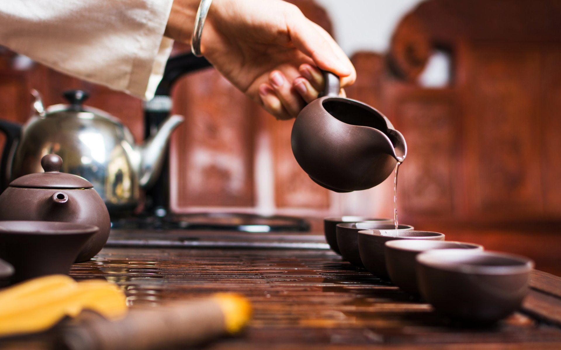 tea being poured from a pot