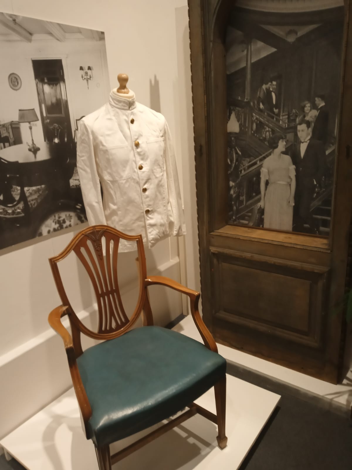 R.M.S. Olympic artefacts, R.M.S. Olympic Grandstaircase window frame, White Star Line first class steward's jacket, R.M.S. Olympic parlour suite sitting room chair.