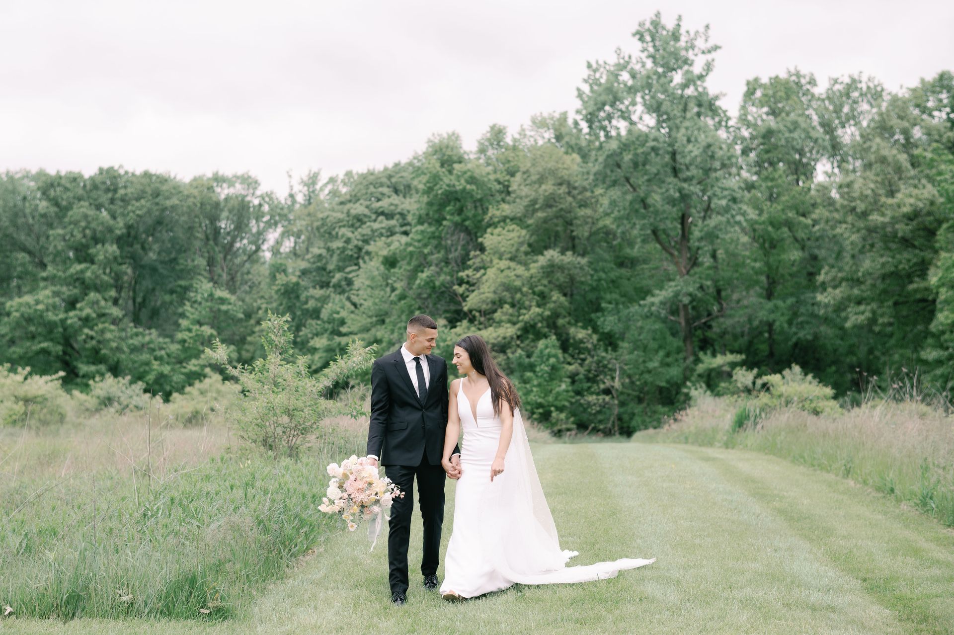Bride and groom portrait in field at Fort Wayne Wedding Venue Union 12