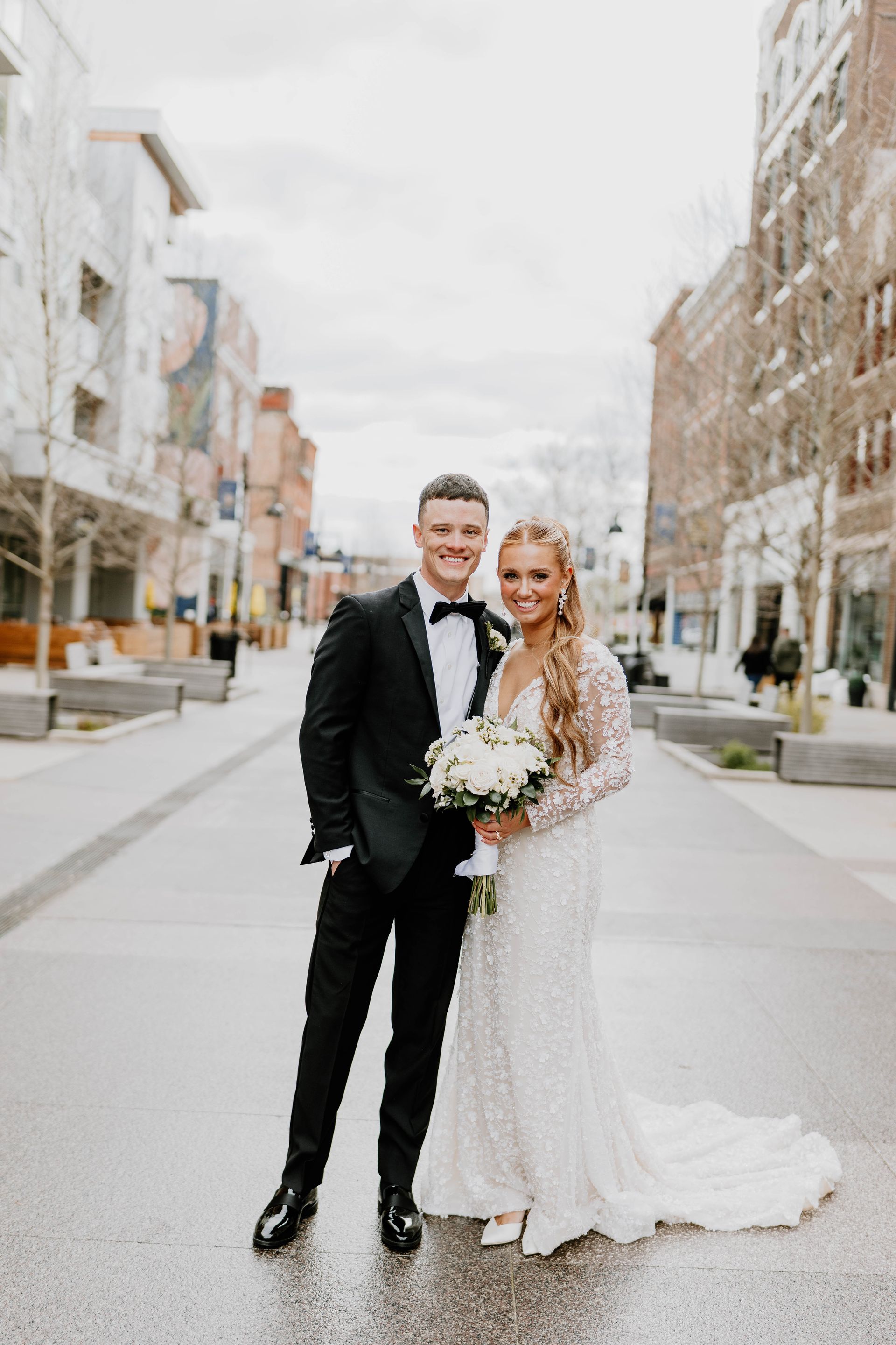 Wedding photo of couple on The Landing in downtown Fort Wayne Indiana, perfect for engagement pictures
