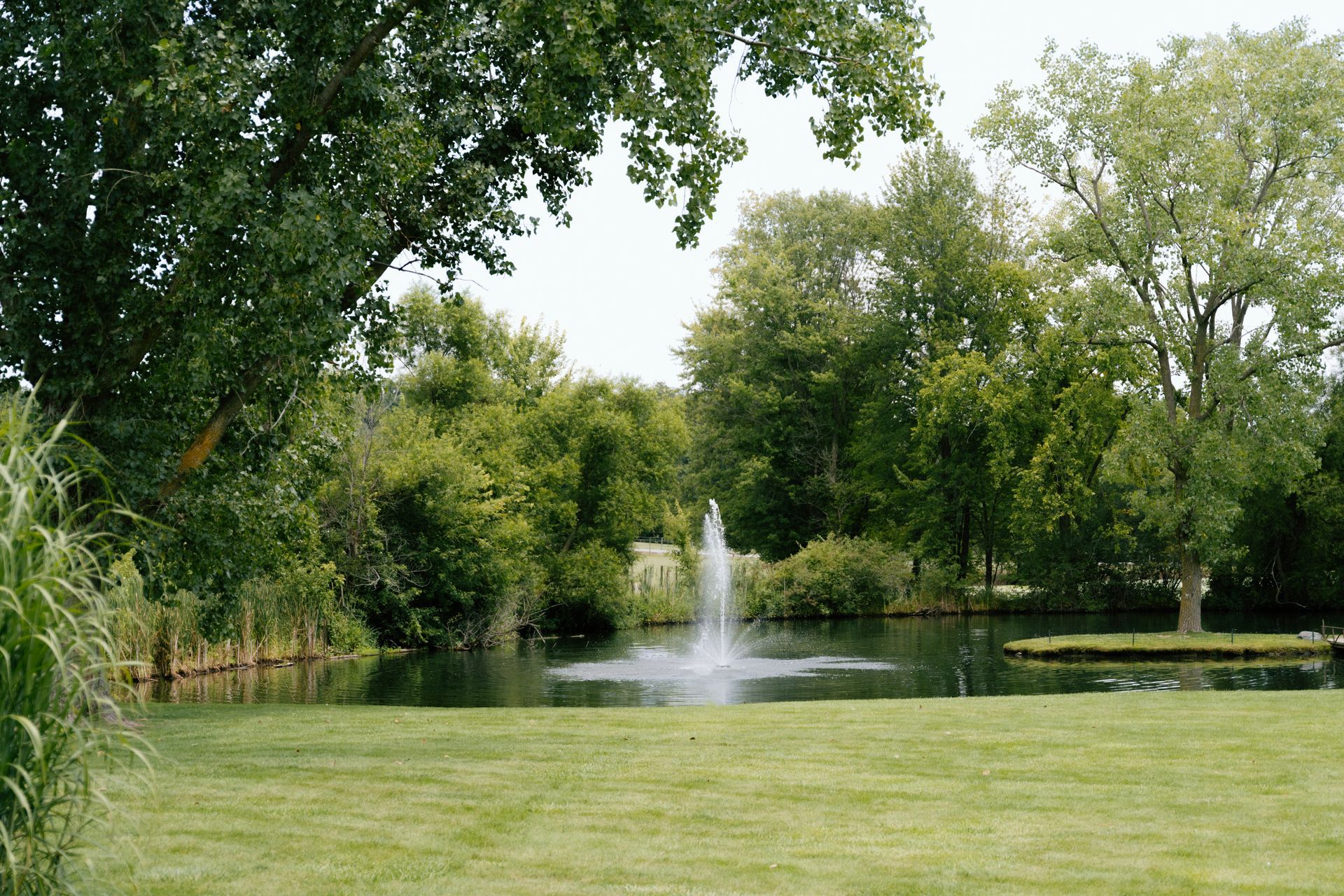 Union 12, a scenic Fort Wayne wedding venue featuring a peaceful pond backdrop