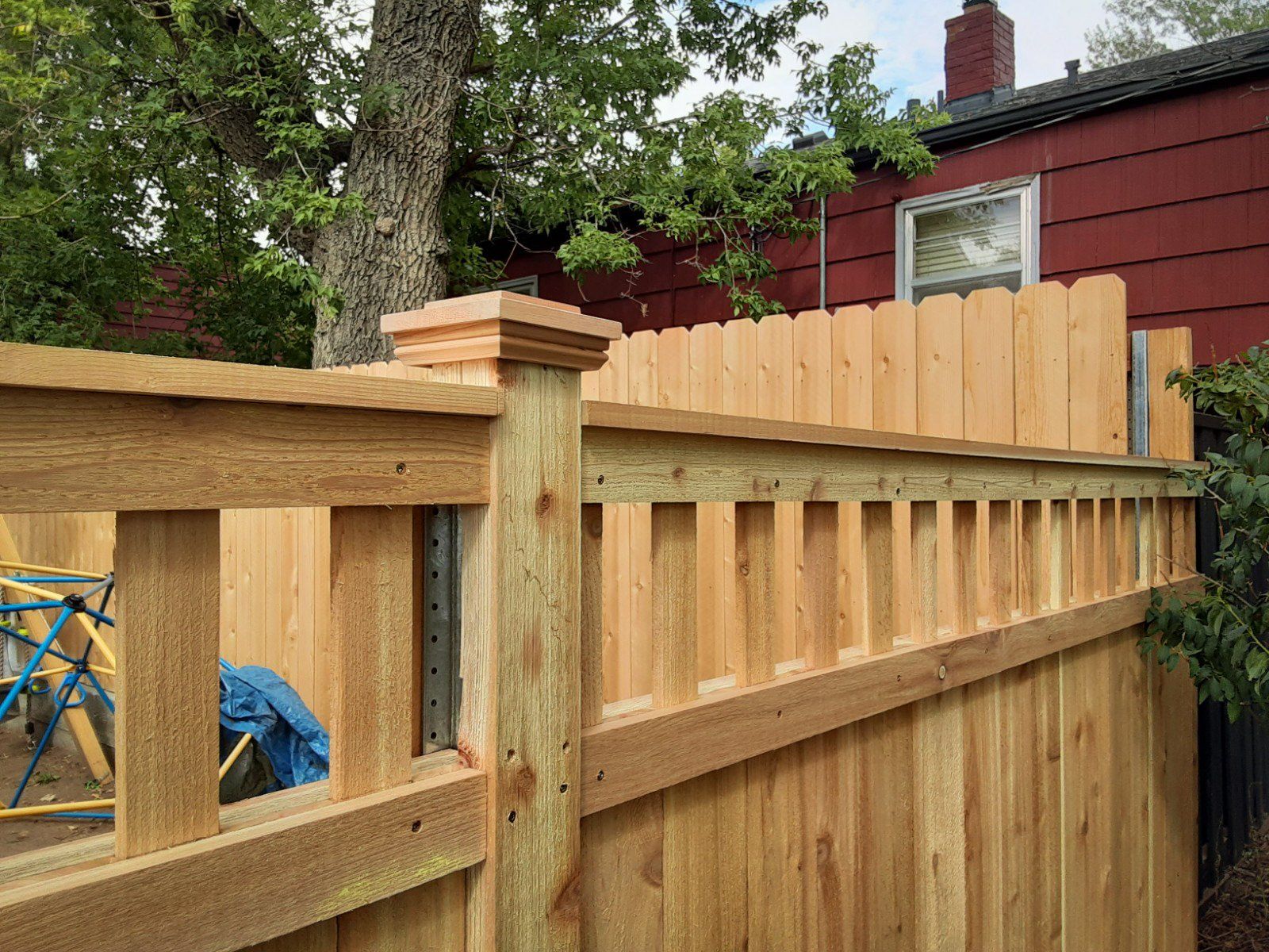 Lattice top craftsman-style cedar fence.