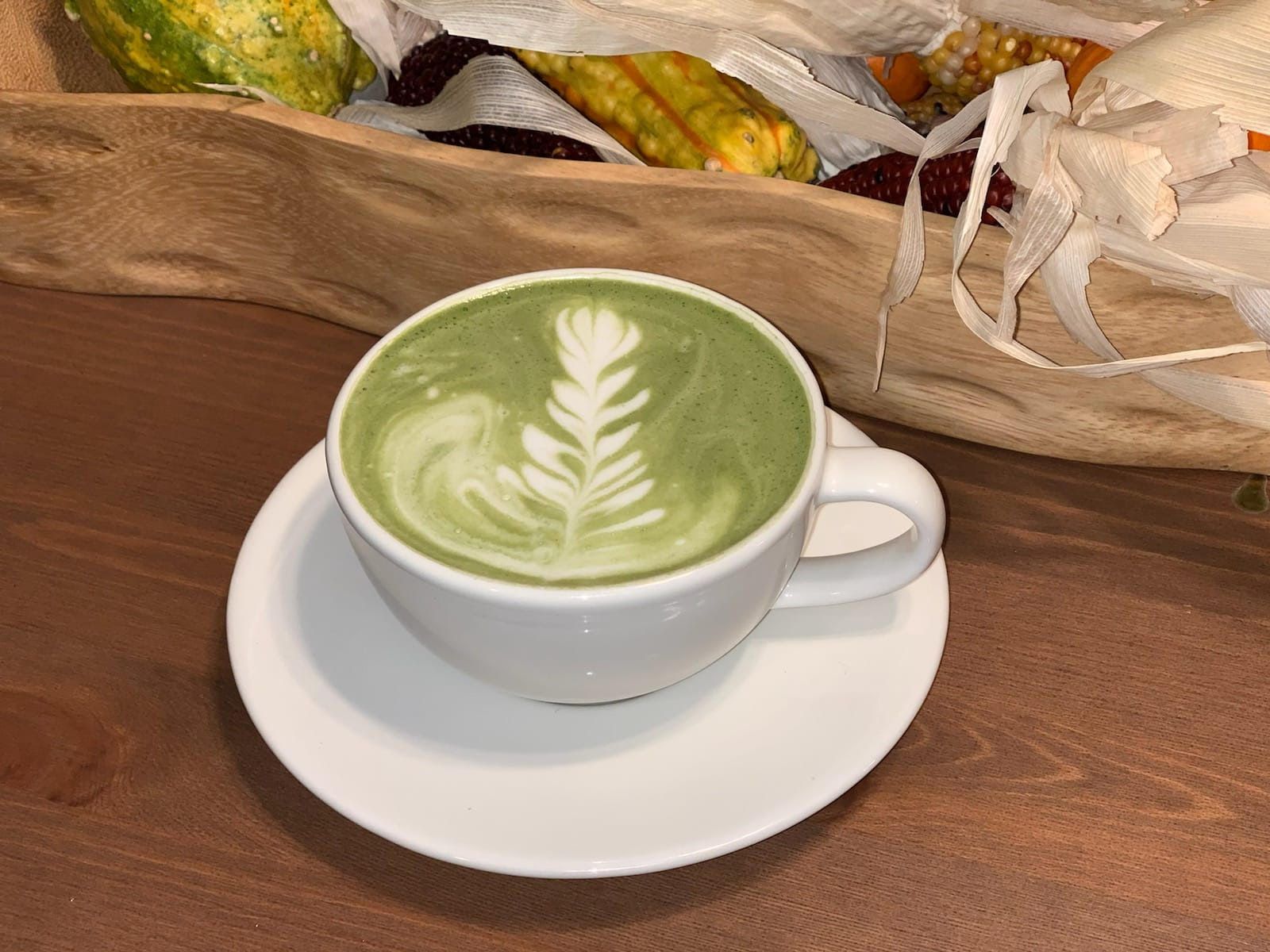 A picture of a cup of matcha coffee