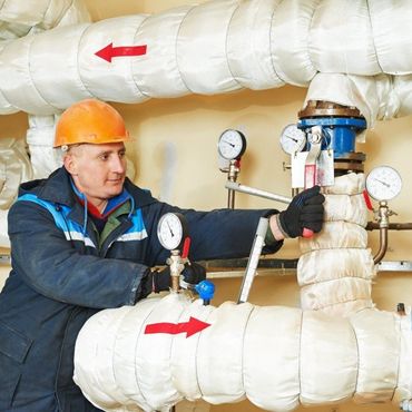 Man Checking HVAC Insulation