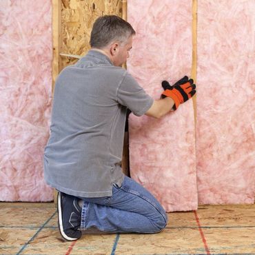 Man Installing Insulation
