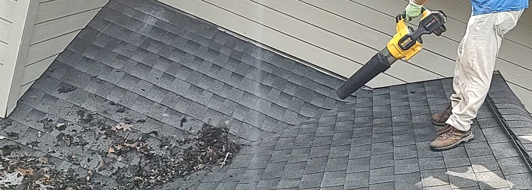 blowing debris off the roof so that it does not re-clog your gutters after we clean them.
