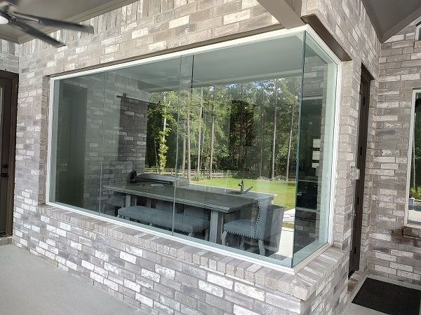 Window cleaning four section show case windows counts as four in Magnolia Texas