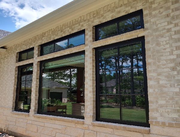 window cleaning medium casement windows with three Transom above each count as six in Magnolia Texas