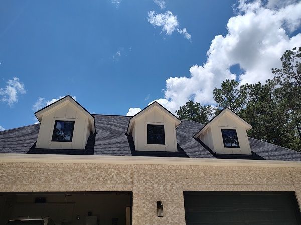 window cleaning above garage dormer windows counts as three in Magnolia Texas
