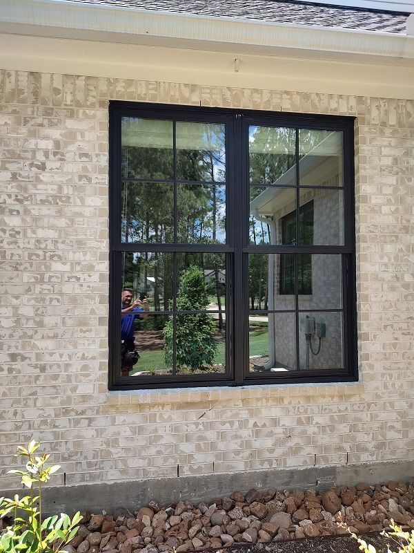 window cleaning side by side standard windows counts as two in Magnolia Texas