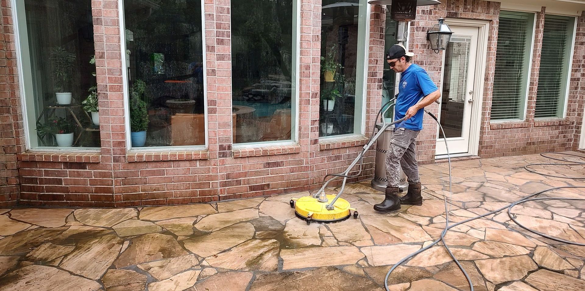 Pressure washing pool patio in Magnolia TX