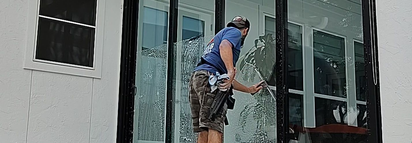 Window Cleaning tall sliding glass patio doors in Magnolia Texas