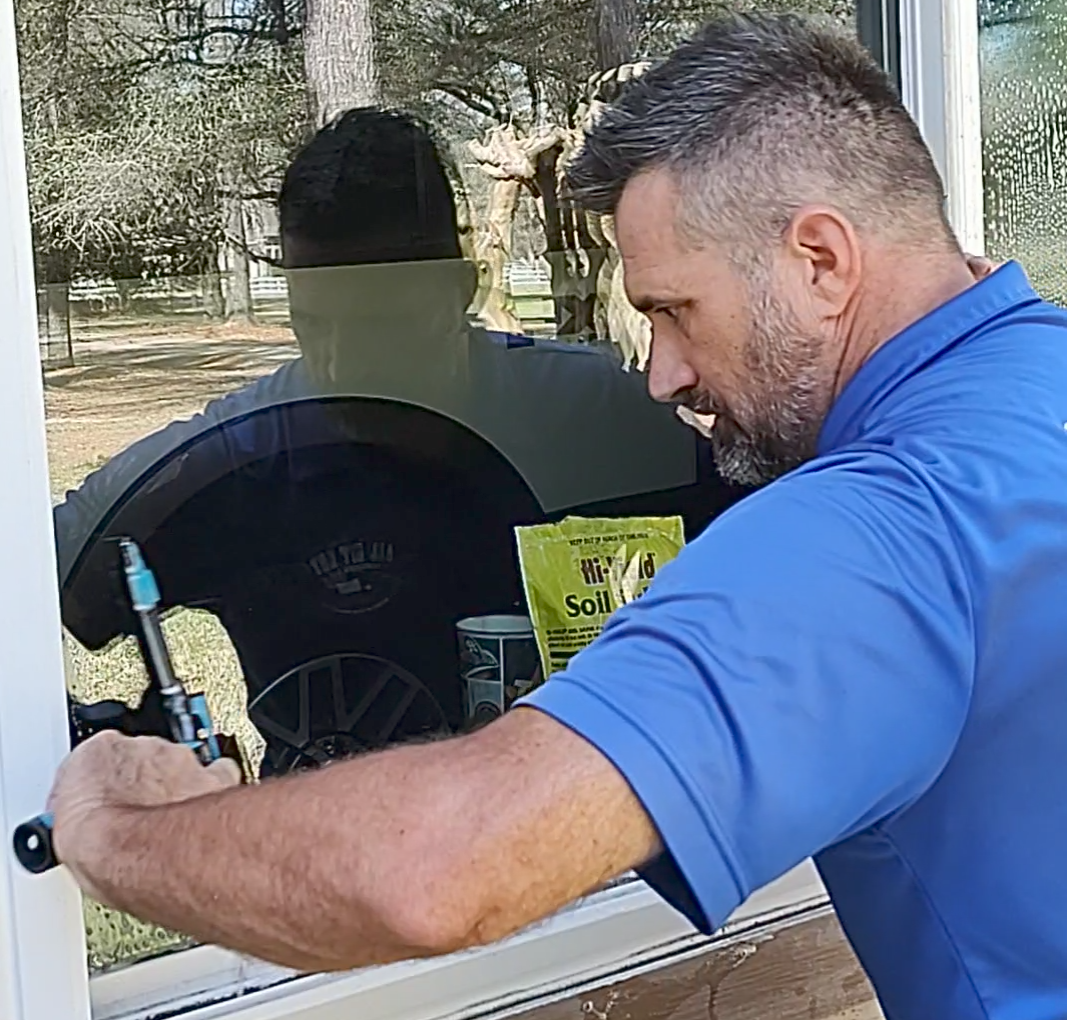 All Git Out Services providing professional retail window cleaning for a local business in Magnolia, TX.