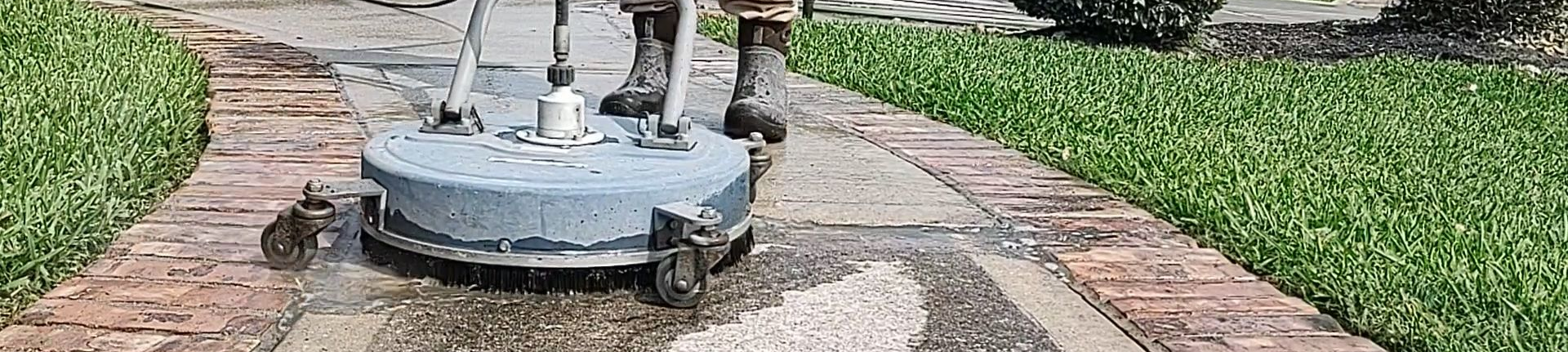 Pressure washing a sidewalk with a 20 inch surface cleaner in Magnolia TX