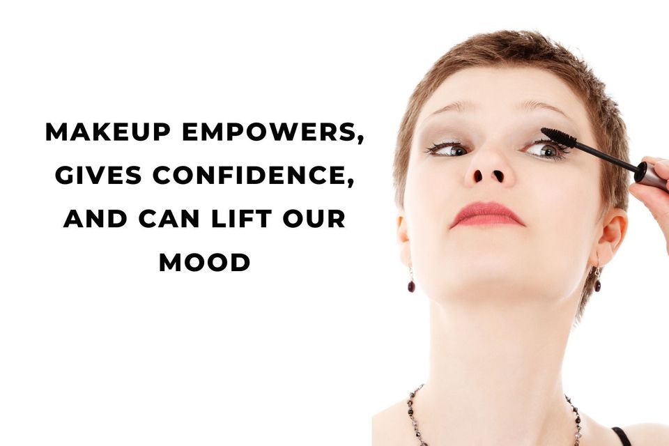 Woman putting some mascara on