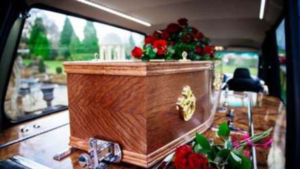 Coffin in hearse at funeral