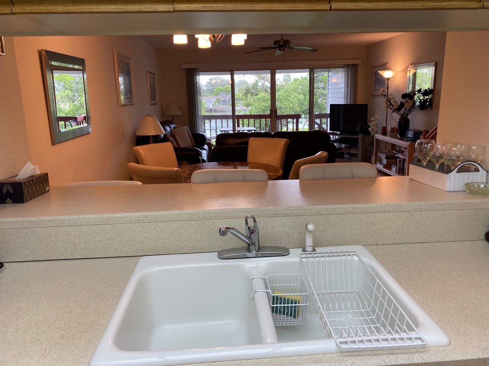 Kitchen sink with opening to dining and living room