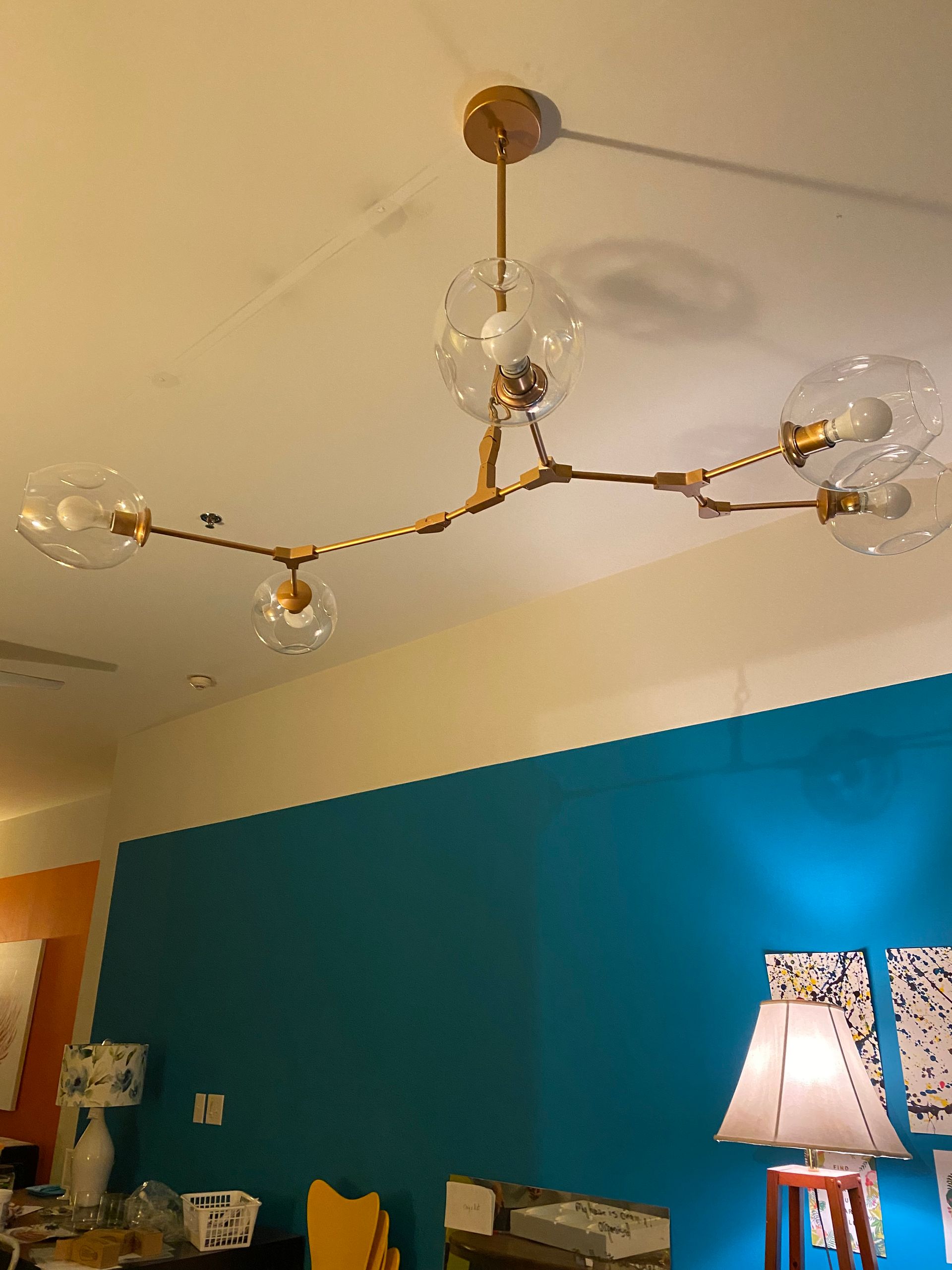 Unique modern light fixture installation in Durham NC with precision electrical wiring by All Wired Up NC