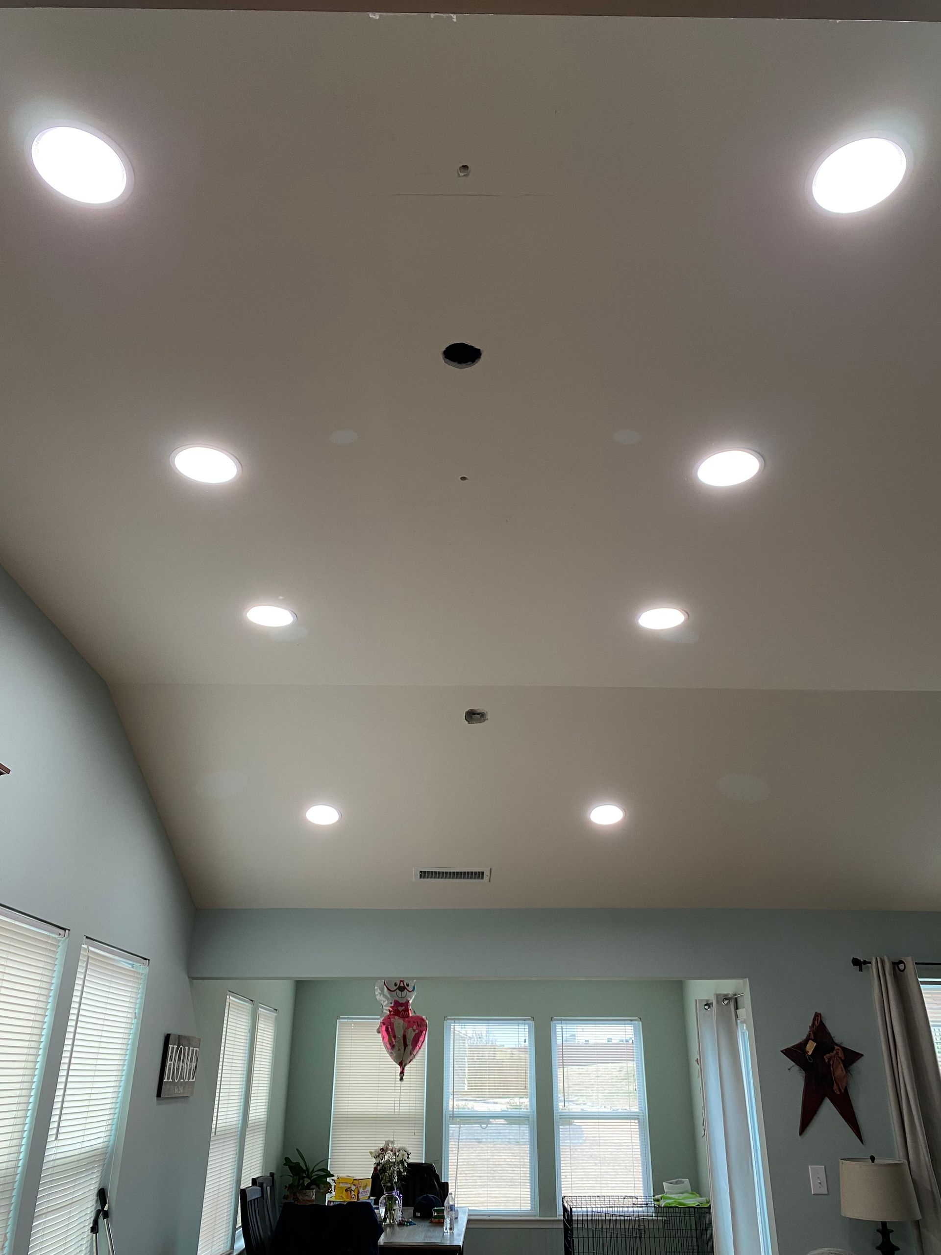 Kitchen lighting upgrade in Rolesville, NC, new recessed lights, under-cabinet lighting, pendant lights for a bright space.