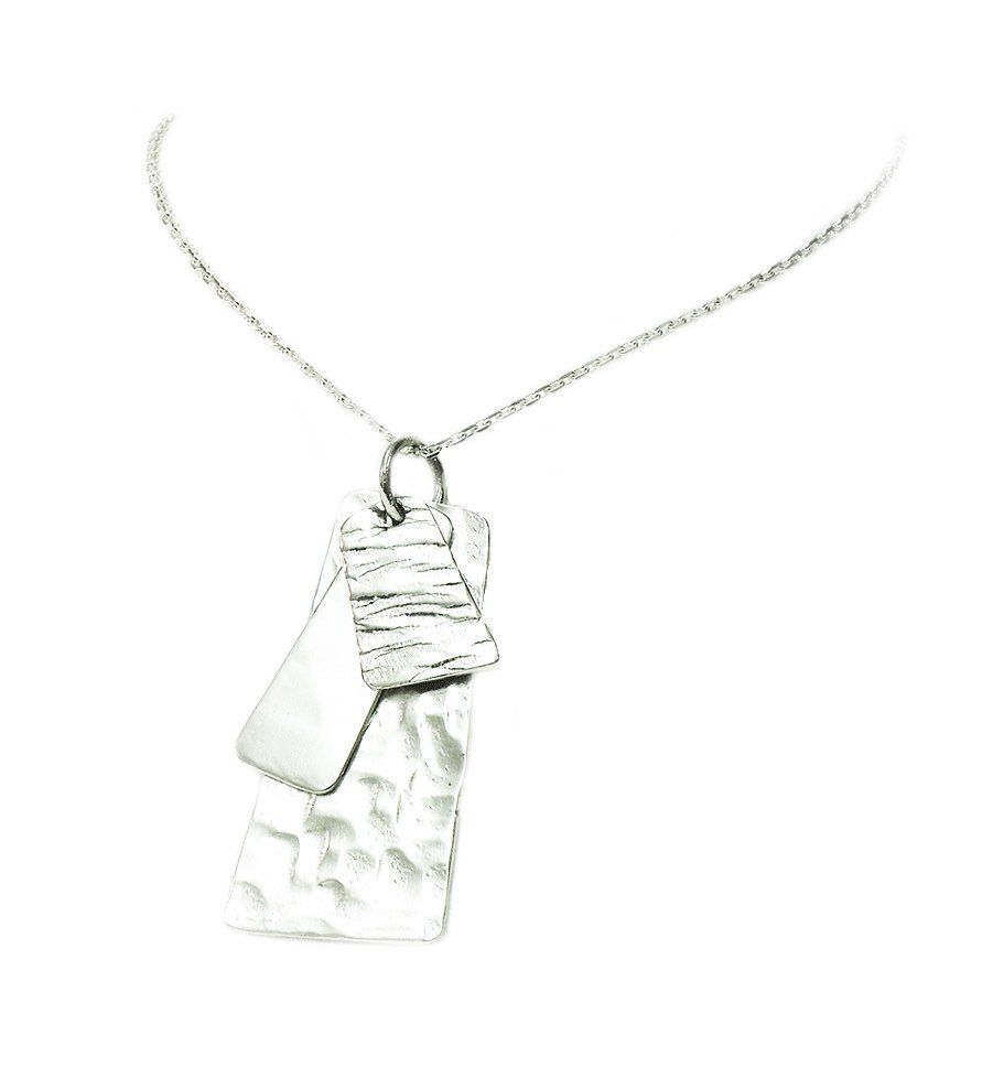 3 piece layered pendant with various textured finishes.