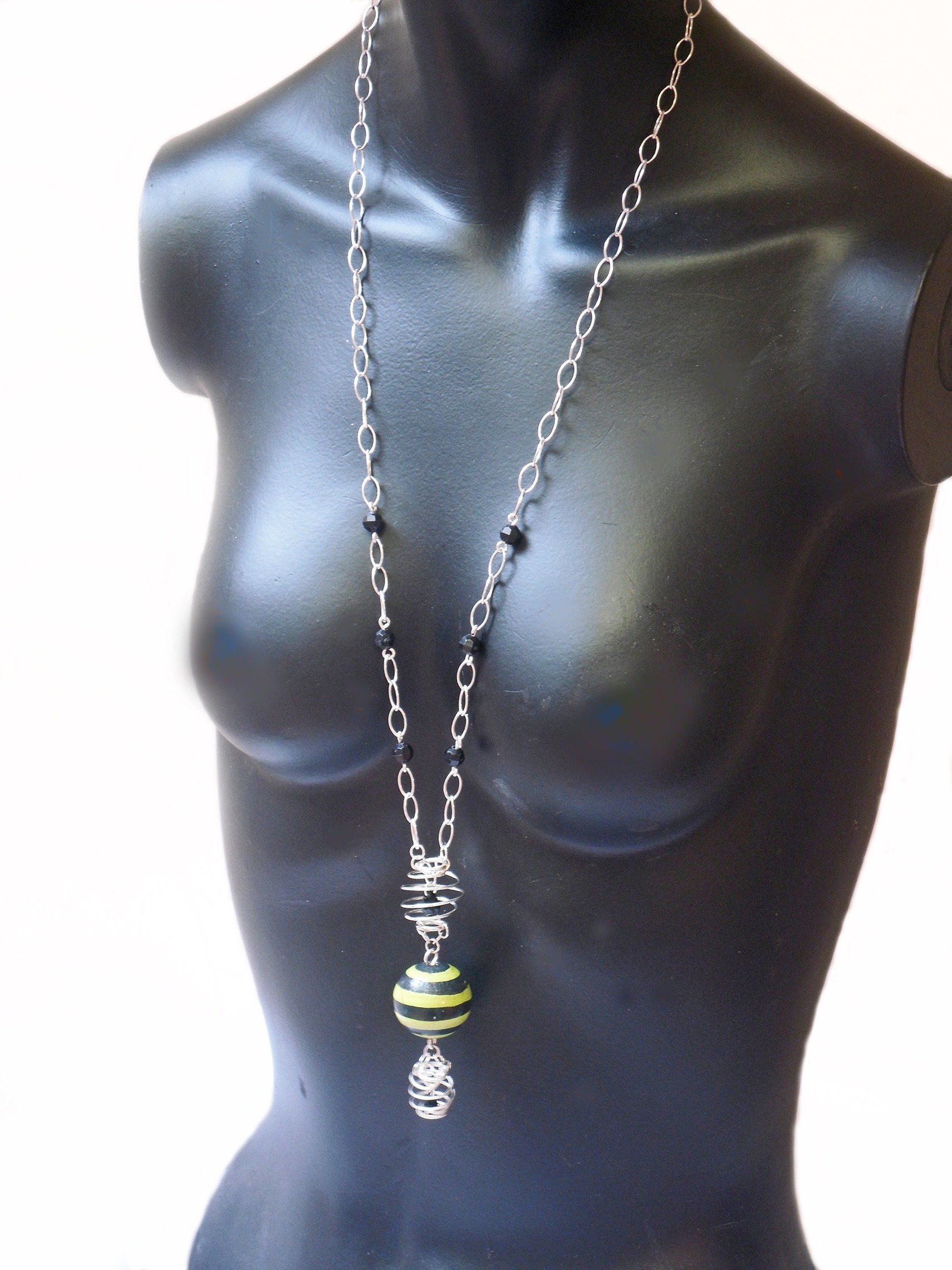 Long Beaded Necklace with wooden beads and cage detail